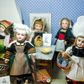 Dolls in kitchen costumes